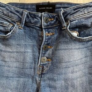 Risen fly button skinny jeans with fringed ankles, size 5